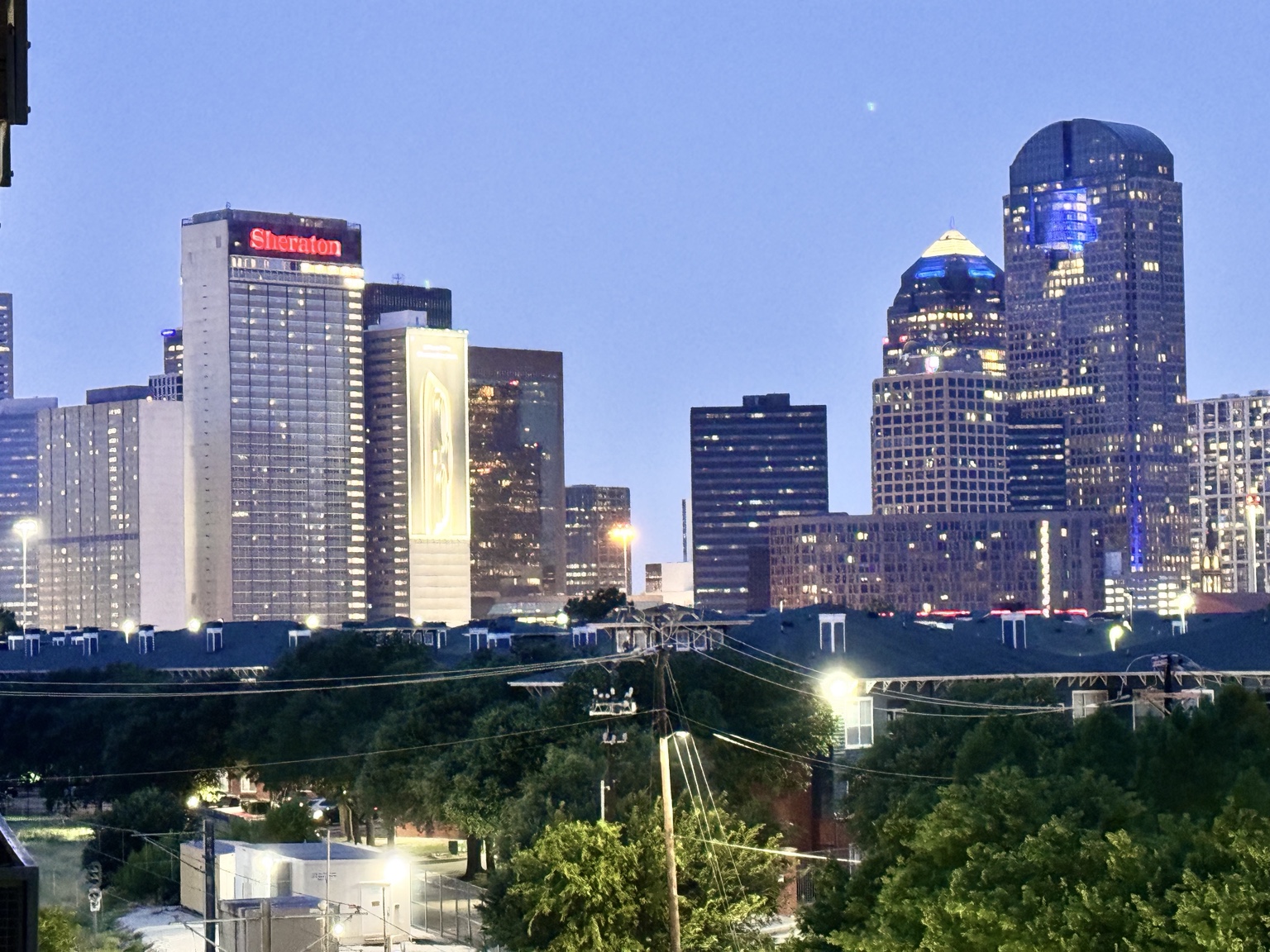 Dallas skyline illuminated in the evening